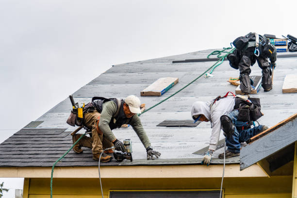 Professional Roofing technician working in Mansfield Center, CT